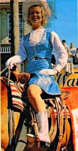 Duchess of Kent riding in the Calgary Stampede Parade - outfit by Elfriede